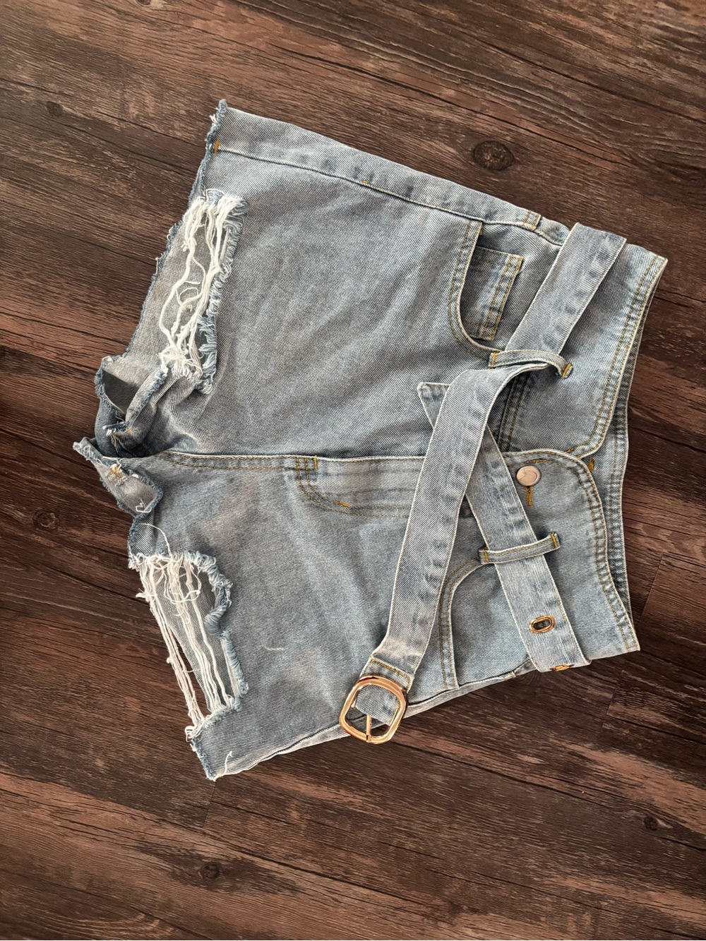 Kittenish High-Rise Distressed Light Blue Denim Shorts with Belt